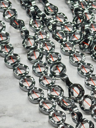 Hematite Wavy Donut Beads Strand - 12mm